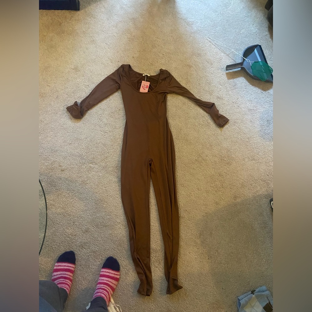 I am selling this open back jumpsuit